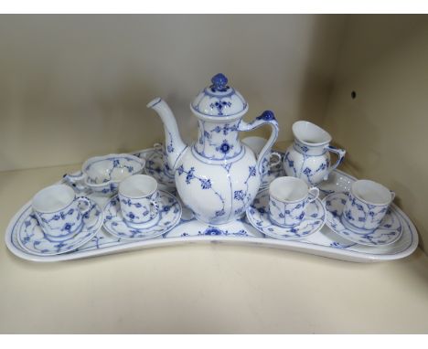 A blue and white Royal Copenhagen coffee set on sixteen pieces including coffee pot, six cups and saucers, tray etc - one pie