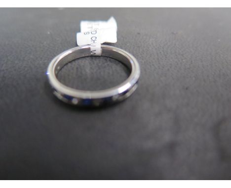 An 18ct white gold 15 stone sapphire and diamond ring size M - approx weight 2.5 grams - ex jewellers stock, in new unused co