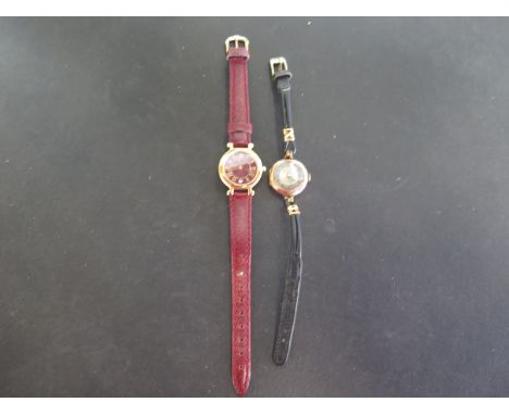 An 18ct gold plated ladies Raymon Weil wristwatch with Roman numerals to dial, date aperture at 6 o'clock and a vintage 9ct g
