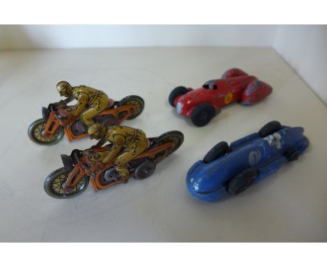 Two small tinplate clock work motorcycles 9cm long and two Dinky race cars - some play wear to all, some rusting to tin plate