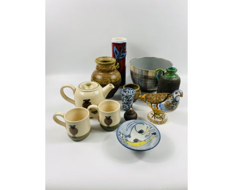 A group of various studio and art pottery,mostly signed,To include bowls,vases,cups,etc.26.5cms high tallest vase.(twelve ite