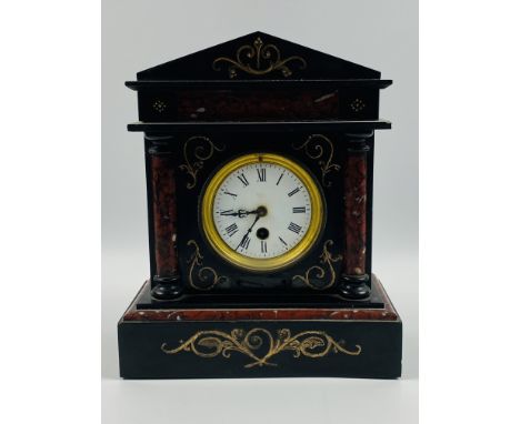 A late 19th century French slate and marble cased mantel clock with gilt decoration.the movement stamped R &amp; Co, Made in 