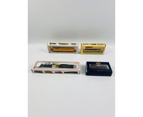 Four Bachmann trains/carriages to include: HO scale GP50 (Union Pacific); Pannier Tank London Transport 1:76/00; HO scale 42'
