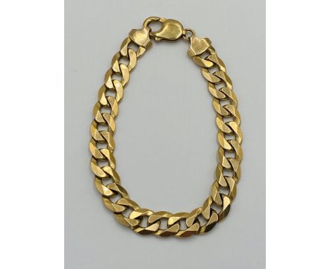 9ct gold curb link bracelet, 30.6g, approximately 21.5cm total length. Estimate: £540-560