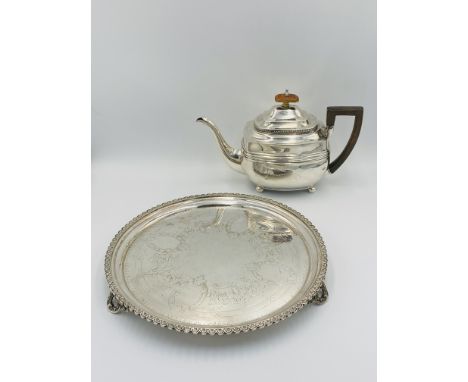 Georgian silver teapot, London 1805, 488g; together with a silver plate salver. Estimate: £230-250