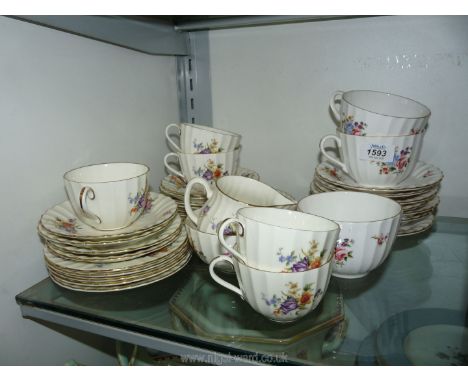 A quantity of Royal Worcester 'Roanoke' china including breakfast and teacups and saucers, tea plates, milk jug, sugar bowl e