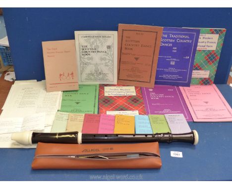 A Tenor Recorder in case with a folder of country dance music