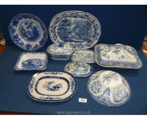 A quantity of blue and white china including Abbey ware shredded wheat dish, Spode lidded tureen, Booths oval platter etc, so