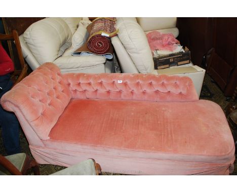 A button back pale pink Draylon upholstered Day Bed standing on painted turned legs, 68" long x 27" deep x 28 1/2" high.