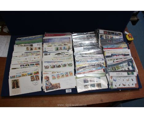 A large quantity of First Day Covers including Christmas 2001/2006 1994, Lest we Forget, The Age of Lancaster and York etc.