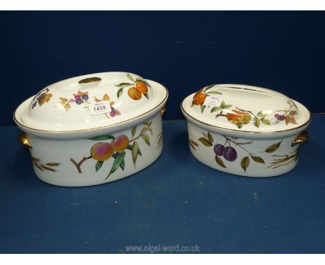 A Royal Worcester Evesham pattern large casserole lidded dish and a medium lidded dish, gold rim slightly worn.