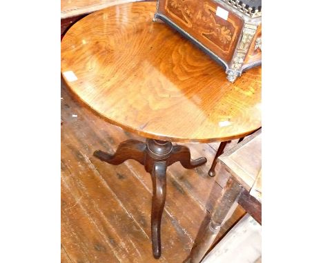 Georgian oak tilt-top on turned column above tripod legs