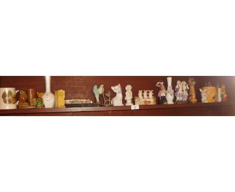 Shelf of assorted china ornaments