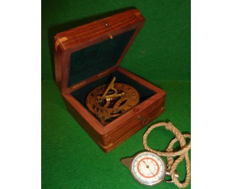 Brass sundial in box (A/F) with map measurer