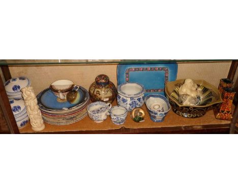 Blue and white china, resin buddha, plates, etc. (one shelf)