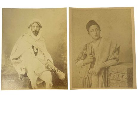 A pair of vintage photographs depicting Arab gentlemen.Size approximately: 25.5 x 20.5cm