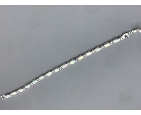 Silver and opal tennis bracelet 13.63g gross