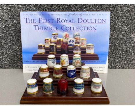 The first Royal Doulton Thimble collection on display stand (12 in total, different patterns)