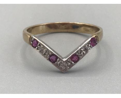 9ct yellow gold diamond and ruby wishbone ring size p 1.9g gross