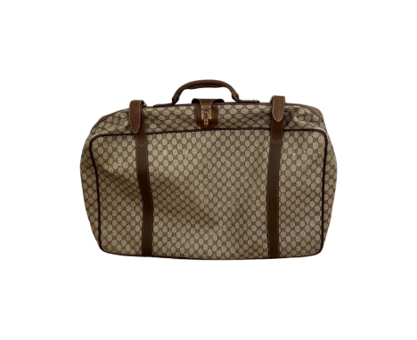 Gucci Soft Trunk Monogram Suitcase with classic brown leather detailing&nbsp;DHL delivery only - based in our Gibraltar offic