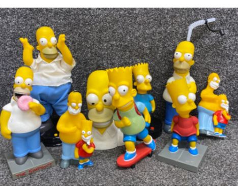 Total of 9 large “the Simpsons” plastic figures (some electronic) including alarm clock etc
