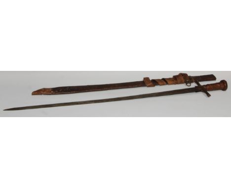 A Sudanese kaskara, 85cm double-edged fullered blade, Crusader crossguard, hide-bound hilt, leather scabbard, 101cm long over