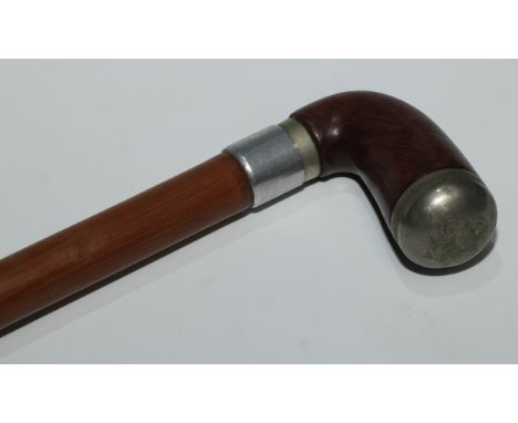 An early 20th century novelty system cane walking stick, the L-shaped handle enclosing a pipe, screw-fitting mechanism, bambo