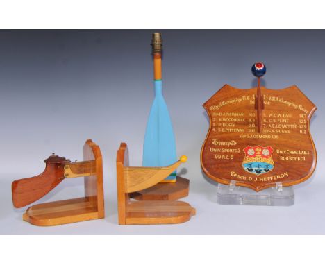 Rowing - a pair of novelty book ends and a table lamp, the ltter as an oar, 47cm high; a presentation shield, City of Cambrid