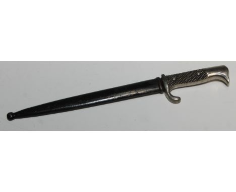 An early 20th century novelty letter knife, of military interest, as a German K98 bayonet and scabbard, 19cm long 