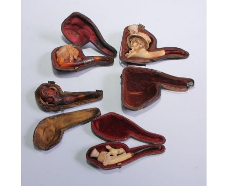 A Meerschaum tobacco pipe, the bowl modelled as the head of a lady of fashion, cased; others (4) 
