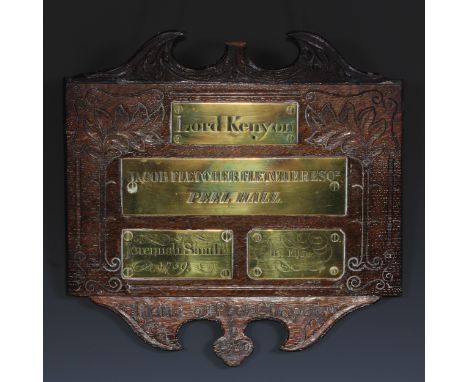 A 18th century salvaged oak panel, Relic of Peel Chapel 1760, applied with brass plaques inscribed Lord Kenyon/Jacob Fletcher
