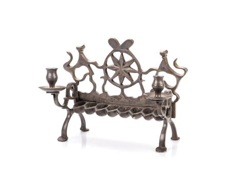 AN EASTERN EUROPEAN PEWTERED BRASS HANUKAH LAMP, PROBABLY LATE 18TH/EARLY 19TH CENTURY the backplate cast with a central eigh