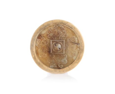 A JADE DISC etched in relief with dragons and phoenix surrounding a square with circle, gilt border, some wear to gilding13cm