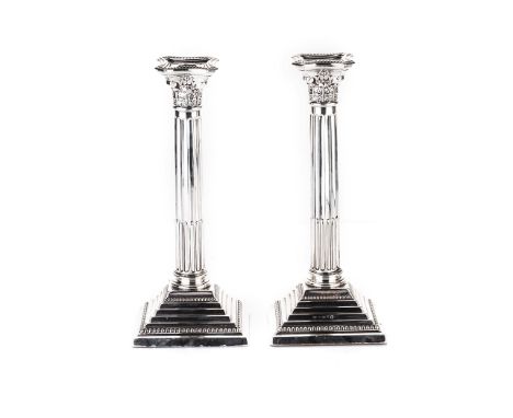 A PAIR OF GEORGE V SILVER CORINTHIAN COLUMN CANDLESTICKS, MAKER'S MARK K&L WITHIN DIAMOND CARTOUCHE, BIRMINGHAM, 1934 (2) the