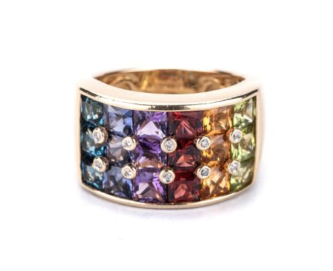 A GEM-SET RING, BROWNS the broad tapered band centered with three rows of channel set princess-cut gemstones, including ameth