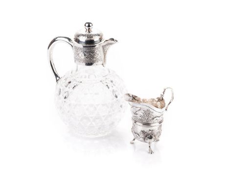 A VICTORIAN SILVER-MOUNTED CLARET JUG, RICHARD MARTIN & EBENEZER HALL, SHEFFIELD, 1890 the bulbous glass body cut with diamon