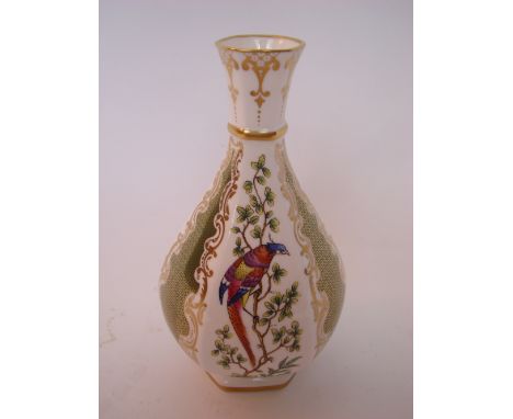 A Royal Worcester Heritage Collection hexagonal baluster form bottle vase, decorated alternately with exotic birds and gilt d