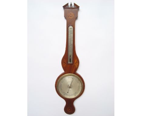A mid 19th Century mahogany wheel barometer, strung and inlaid with flowered shell patterae, with thermometer and 20cm diamet