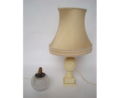 An alabaster pineapple table lamp, on square plinth base, 42cm high together with a spherical cut glass table lamp base. 