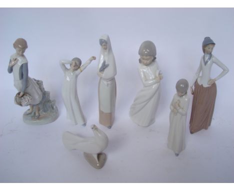 Seven Nao figurines to include a dove, a girl with a flower basket, a girl in a night dress etc (one with repair). 