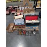 Vintage Coke cans, original NAPA parts, 8 track tapes, vintage bottles