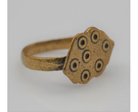 A Roman style evil eye bronze ring, an ellipse shape plaque with ring marking on a court shape band. Accompanied by antique b