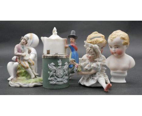 A small silver rimmed stoneware cup along with various ceramic figures and a pair of miniature busts. H.8cm (tallest) 