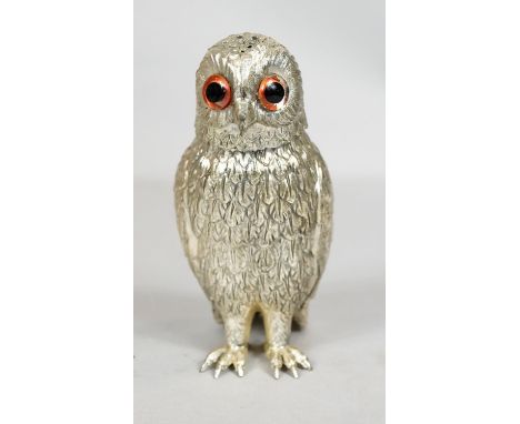A vintage cast silver plate Corbell &amp; Co. sugar shaker in the form of an owl, with glass eyes. Makers mark to the base. H