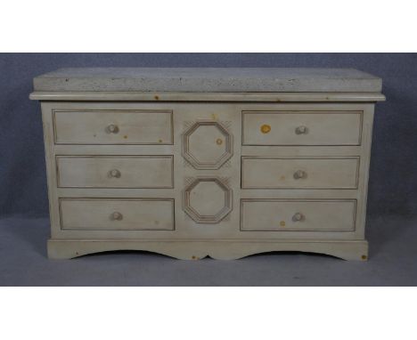 A Continental painted chest of six drawers with limestone slab top on shaped bracket feet. H.90 W.102 D.58.5cm 