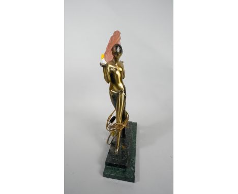 An Art Deco table lamp with glass fan shade and spelter dancer on stepped marble base. H.49 W.34 