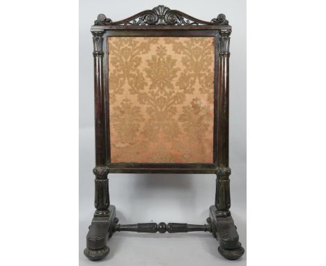 A William IV mahogany fire screen with tapestry inset panel. H.107cm 
