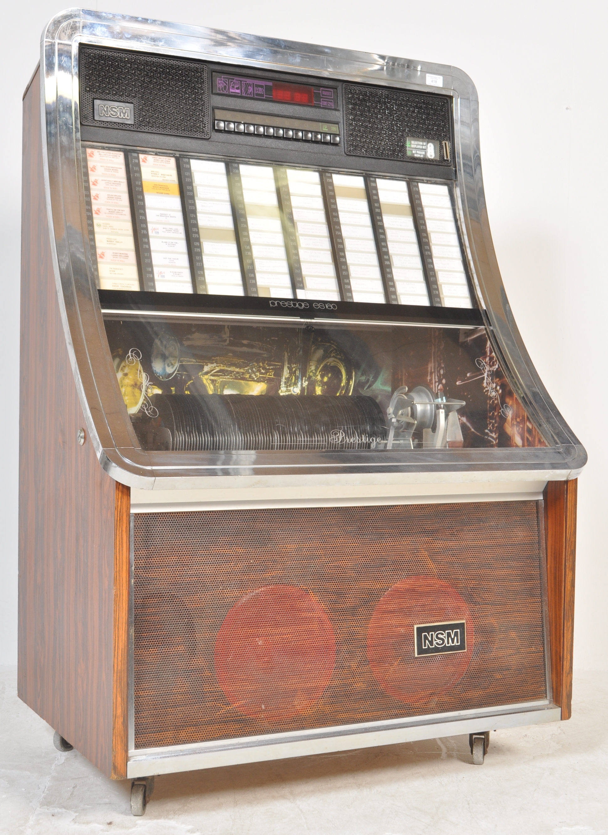 A retro 20th century NSM Prestige ES160 coin operated Jukebox with