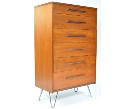 A 1960's retro vintage teak wood chest of drawers in the manner of G-Plan Fresco range comprising of six graduating drawers e