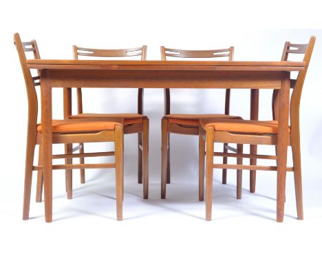 Farstrup - A 1960's Danish retro vintage teak wood dining suite comprising of a rectangular draw leaf extending table raised 